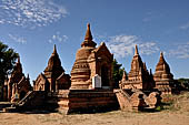 The cluster of red brick temples, named Khay-min-gha on the map on the North plain of Bagan. Myanmar. 